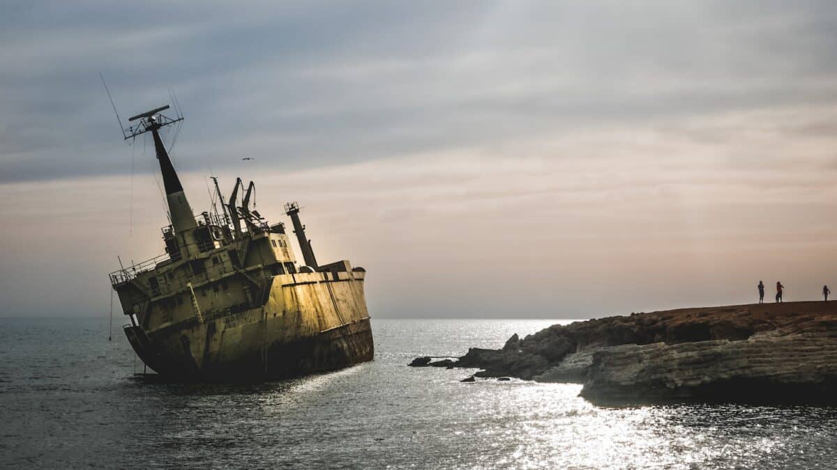 white ship docked near island